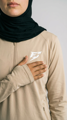 EARNED Women’s Modest Performance 1/4 Zip – Sand